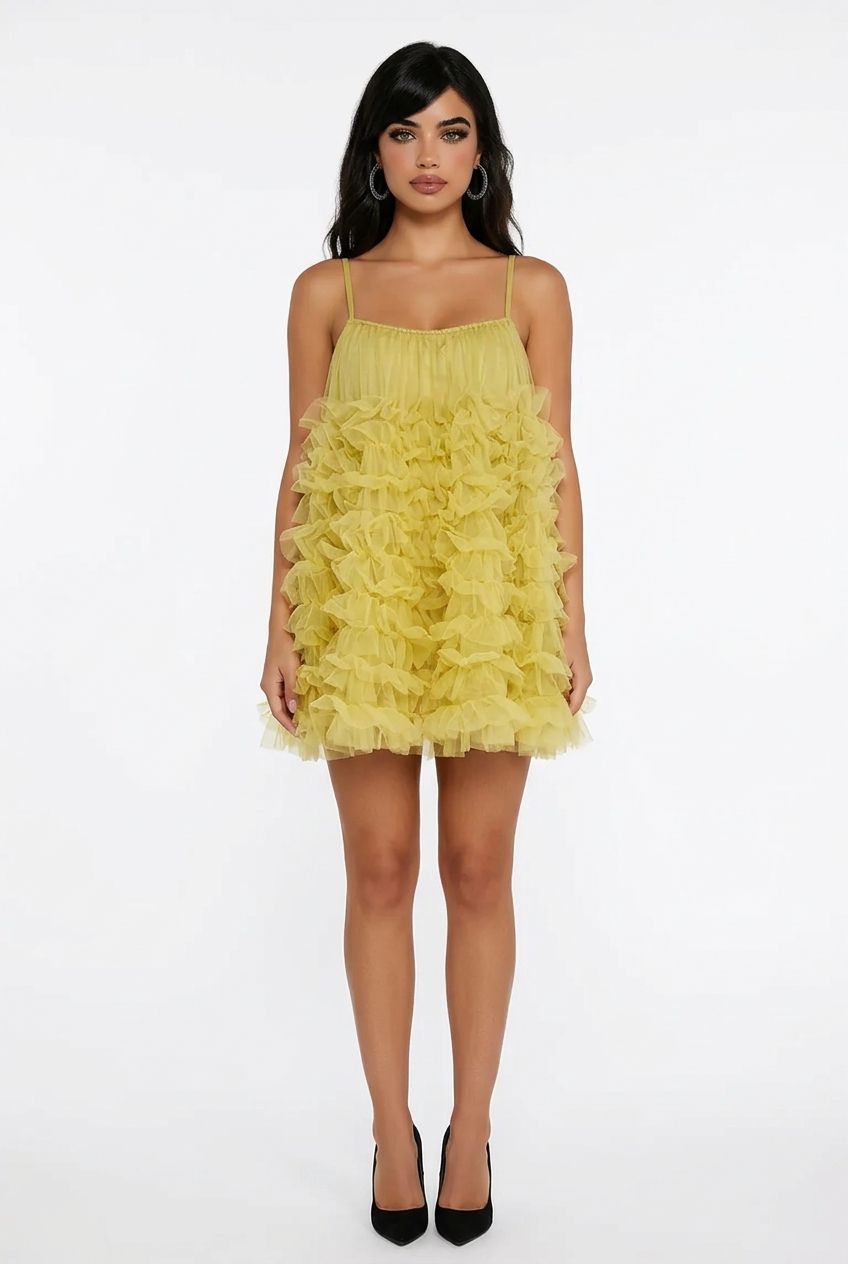 A sleeveless, solid-coloured sundress with a French waistband, ideal for a summer birthday party