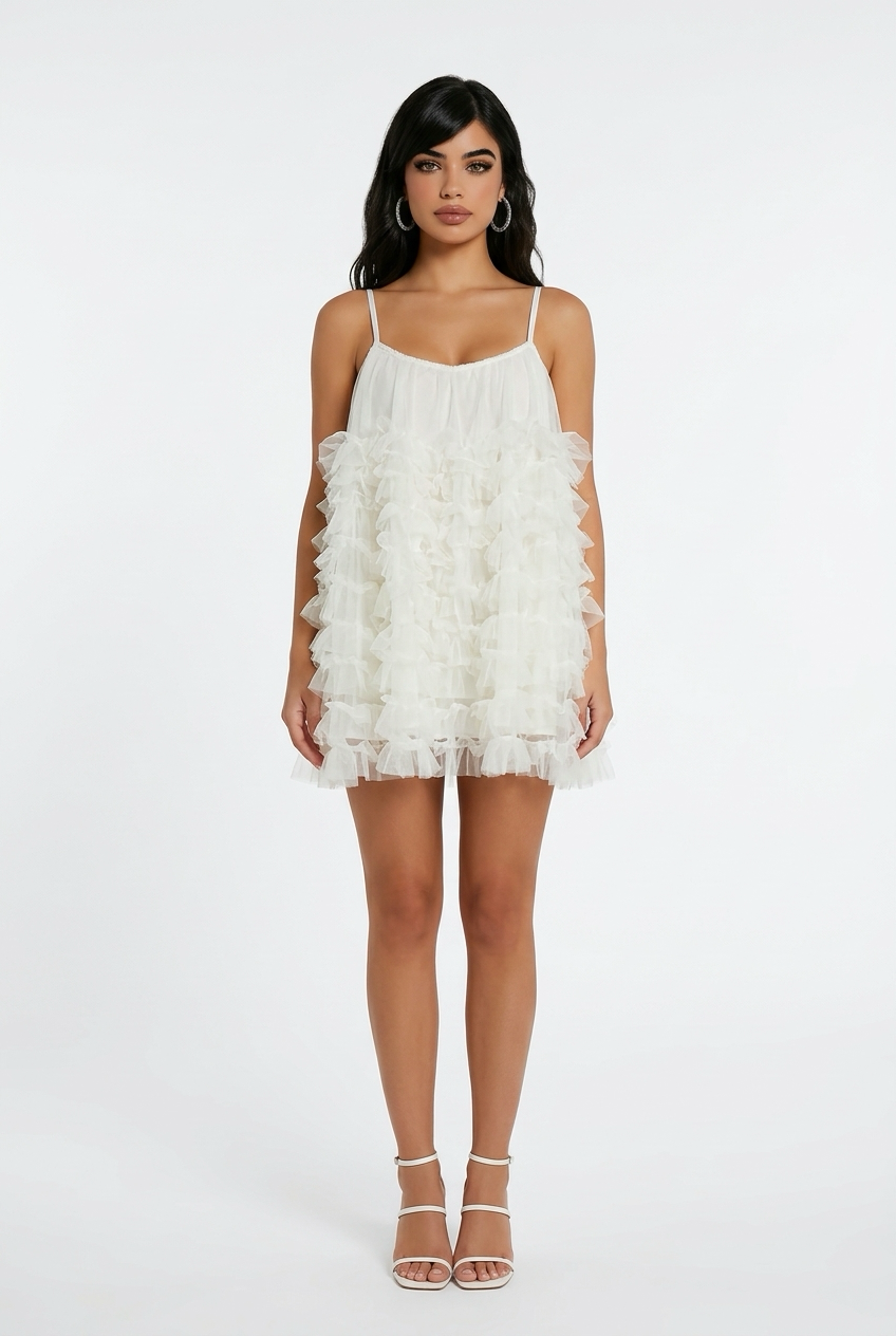 A sleeveless, solid-coloured sundress with a French waistband, ideal for a summer birthday party