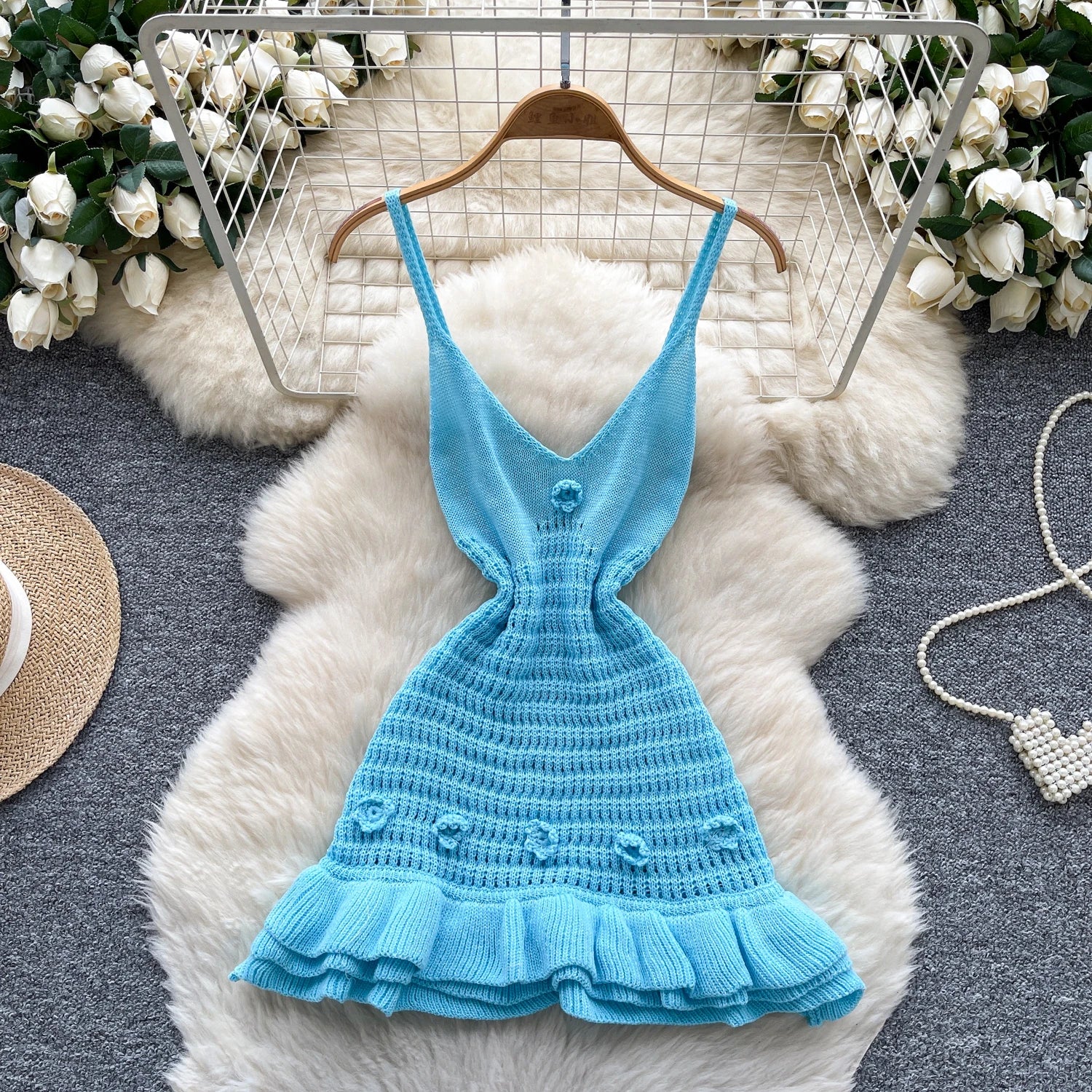 A women’s summer tunic hip midi dress with an empire waist, ruffled lace detailing, and a fitted silhouette.