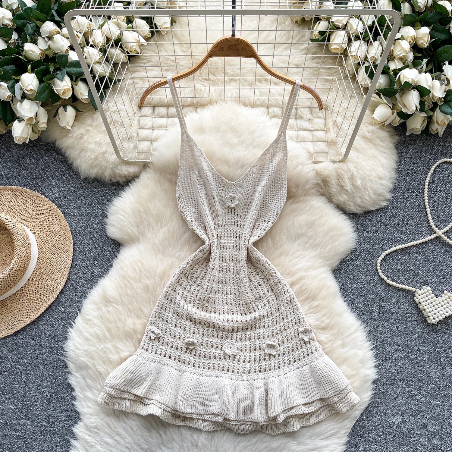 A women’s summer tunic hip midi dress with an empire waist, ruffled lace detailing, and a fitted silhouette.