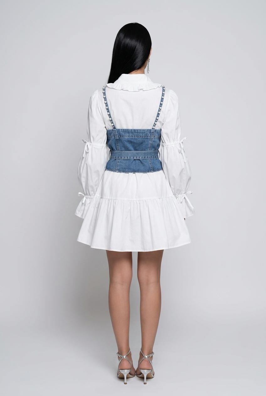 This two-piece spring women’s outfit consists of a diamond-beaded puff-sleeve long-sleeve shirt top, a tassel pearl sling vest, and a long-sleeved shirt.