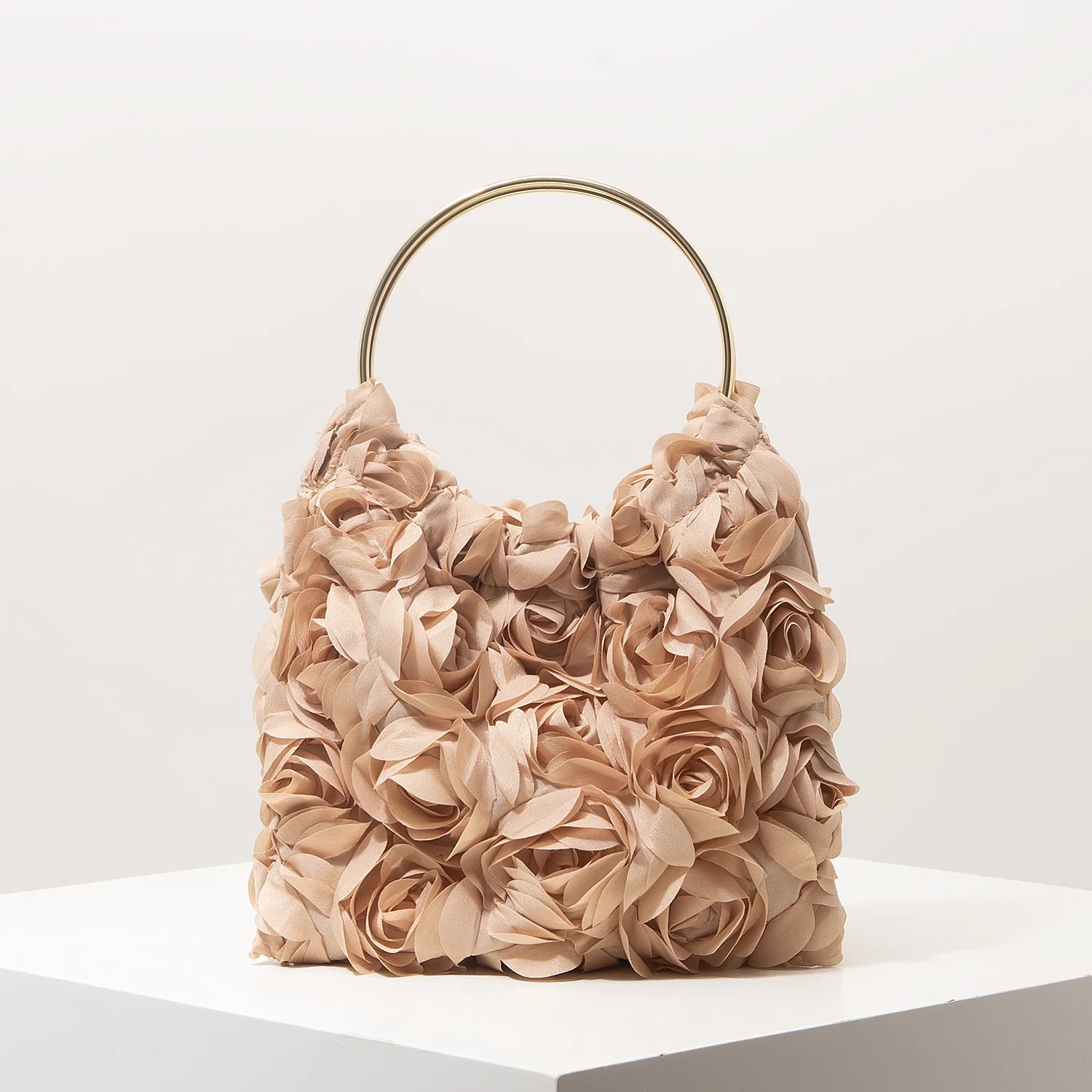 Ladies’ elegant tote bags, prom dresses, and party bags with random patterns.