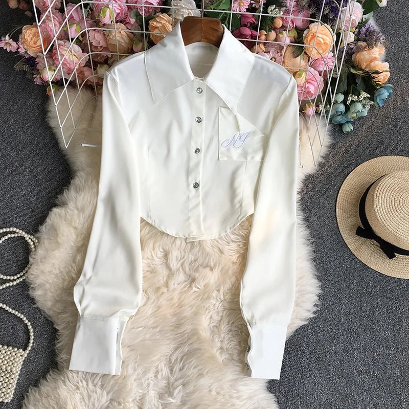 Chic casual solid crop top women’s blouse with a turn-down collar, single-breasted, long sleeves, and shirts.