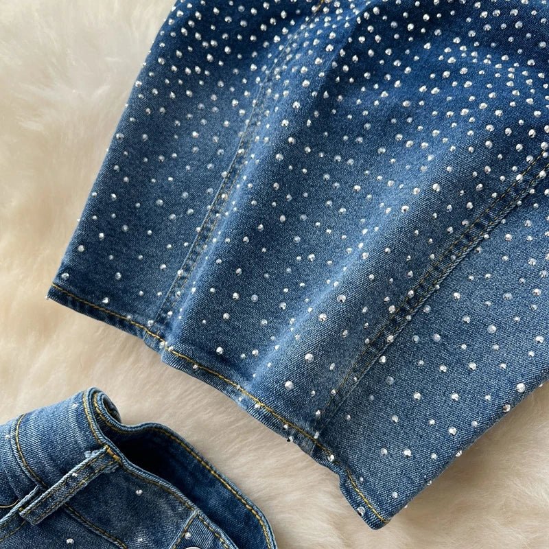 A stylish women’s summer outfit featuring a versatile sleeveless strapless vest with rhinestones and high-waisted denim trumpet pants.