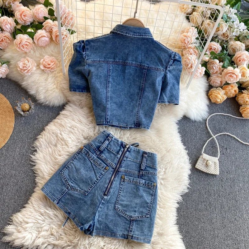 American vintage denim two-piece sets for women feature polo collars, hollow-out tops, and high waistband bandage hot shorts.