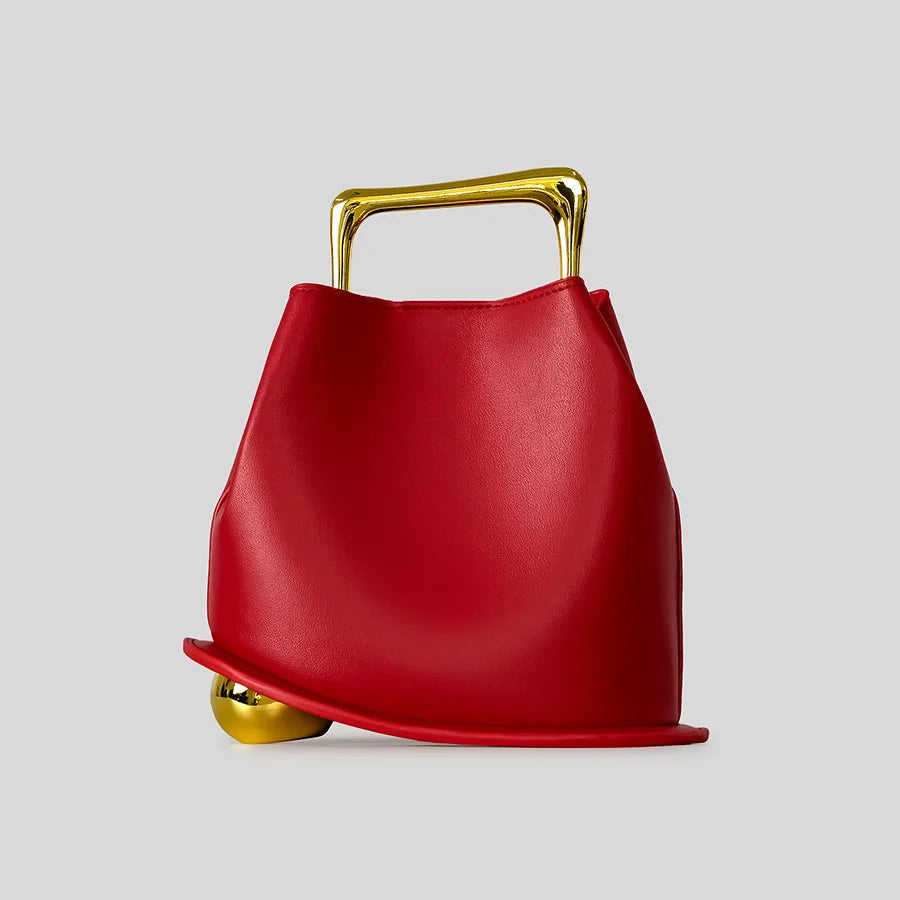 A unique, irregular hand-held bucket design crafted from luxurious pu leather.