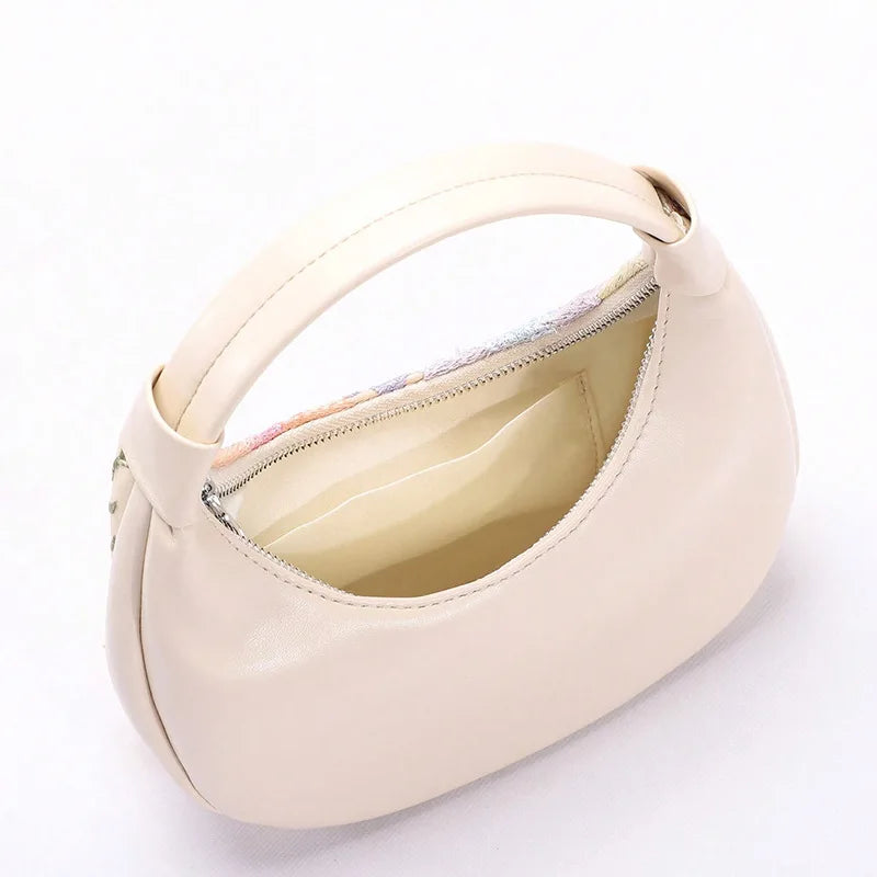 Ladies’ luxurious sequin handbags and floral bags