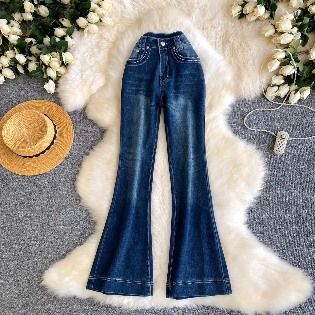 High - waisted, distressed French - inspired jeans with a versatile design, perfect for office wear. - MODE SEPHRA