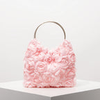 Ladies’ elegant tote bags, prom dresses, and party bags with random patterns.