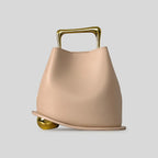 A unique, irregular hand-held bucket design crafted from luxurious pu leather.
