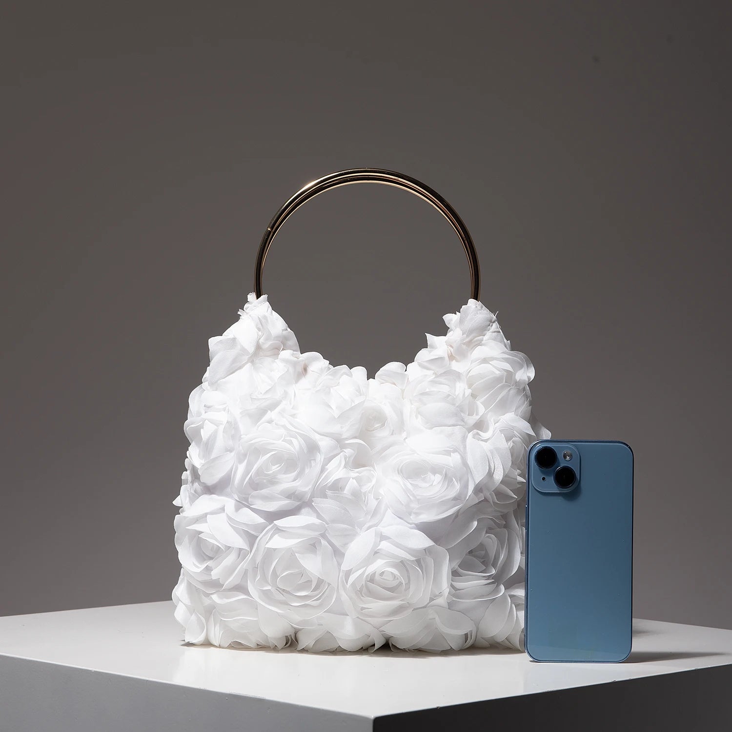 Ladies’ elegant tote bags, prom dresses, and party bags with random patterns.