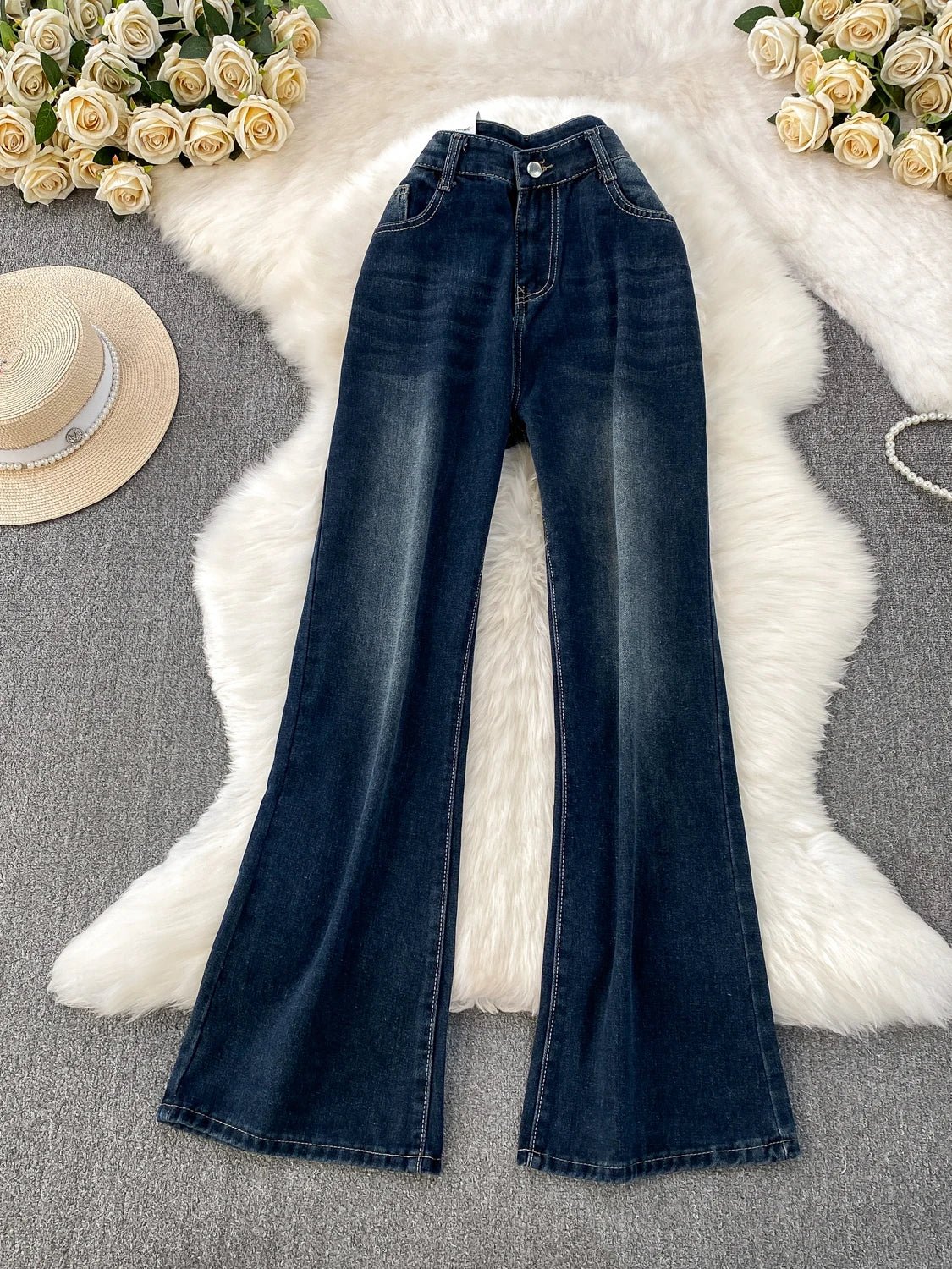 A pair of small-sized, retro American blue denim flared pants with heightening slim elastic, perfect for casual winter wear.